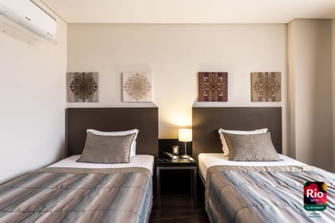 Standard Twin Room | Minibar, in-room safe, soundproofing, free WiFi