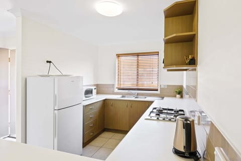 2 Bedroom Superior Apartment | Private kitchen | Full-size fridge, microwave, stovetop, coffee/tea maker