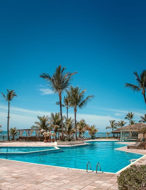 Outdoor pool, pool umbrellas, sun loungers