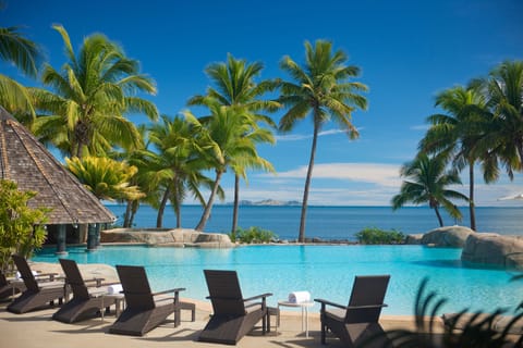 Outdoor pool, pool umbrellas, sun loungers