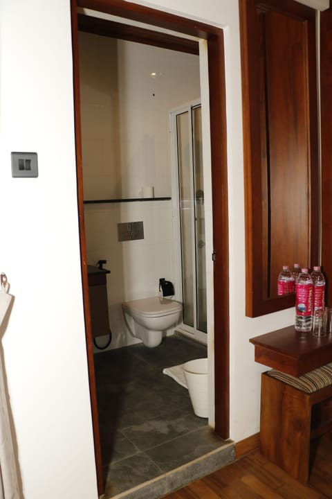 Deluxe Quadruple Room, 1 Bedroom, Hill View | Bathroom | Shower, hair dryer, towels