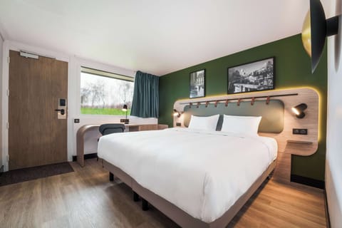 Premium bedding, desk, blackout drapes, iron/ironing board