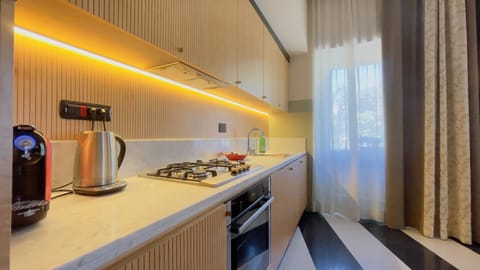 Design Apartment, 1 Bedroom (4.4) | Private kitchen | Full-size fridge, microwave, stovetop, dishwasher