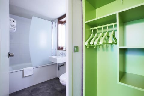 Eco-friendly toiletries, hair dryer, towels