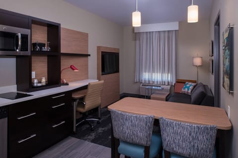 Suite, 1 Bedroom | Desk, laptop workspace, blackout drapes, iron/ironing board