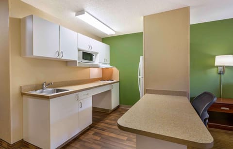 Studio, 1 King Bed, Non Smoking | Private kitchen | Full-size fridge, microwave, stovetop, coffee/tea maker