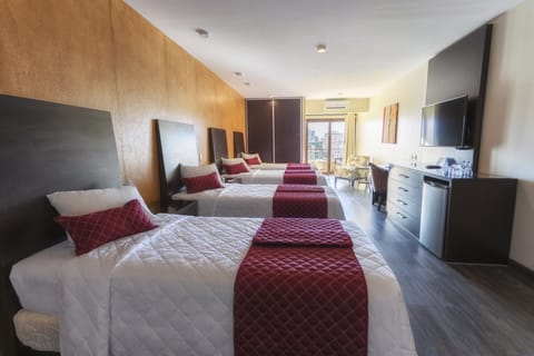 Family Suite (Cuadruple) | Minibar, in-room safe, individually decorated, individually furnished