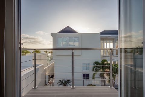 Junior King Suite with Private Solarium Pool View and Partial Ocean View | View from room