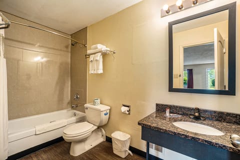 Two queen beds non smoking | Bathroom | Combined shower/tub, jetted tub, hair dryer, towels