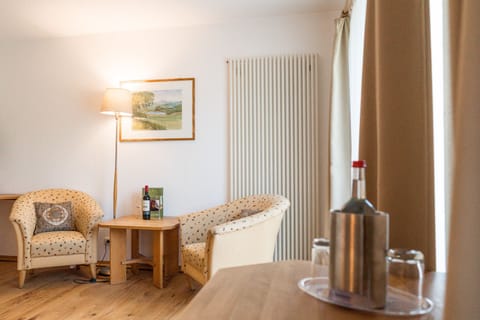 Triple Room, 3 Twin Beds, Balcony, Garden Area | Living area | Flat-screen TV