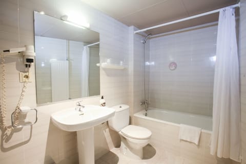 Combined shower/tub, deep soaking tub, hair dryer, bidet