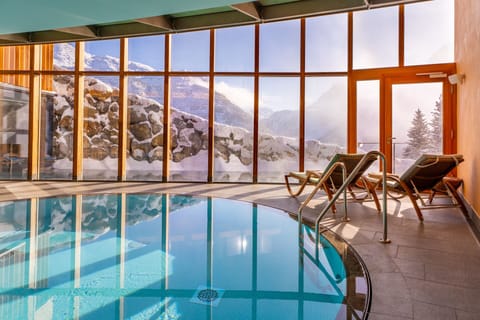 Indoor pool, outdoor pool, pool umbrellas, sun loungers