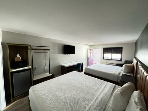 Deluxe Double Room, Multiple Beds, Non Smoking | Free WiFi, bed sheets