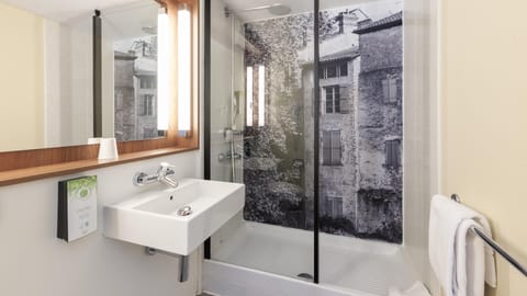 Eco-friendly toiletries, hair dryer, towels