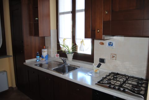 Deluxe Apartment, 1 Bedroom, Kitchenette, Hill View | Premium bedding, minibar, desk, laptop workspace