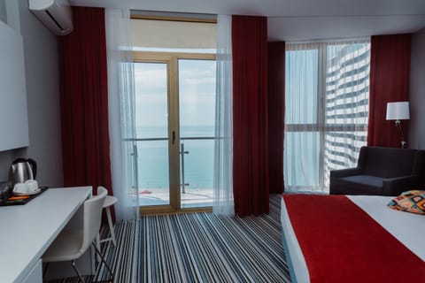 Standard Triple Room, 1 Bedroom, Sea View | Premium bedding, pillowtop beds, minibar, in-room safe