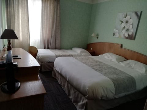 Triple Room | Premium bedding, Select Comfort beds, desk, iron/ironing board