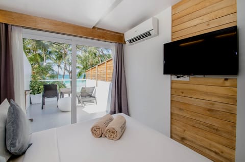 Beachfront, Balcony | In-room safe, soundproofing, free WiFi, bed sheets