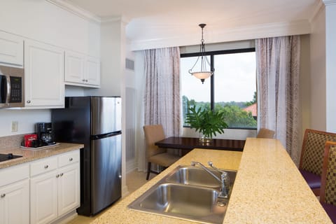 Signature Suite, 1 King Bed with Sofa bed | Private kitchen | Fridge, microwave, coffee/tea maker