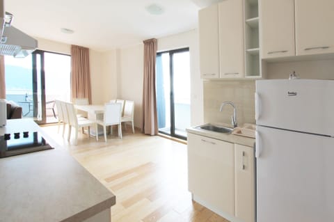 Classic Apartment, 3 Bedrooms, Balcony, Sea View | Private kitchen | Full-size fridge, stovetop, electric kettle