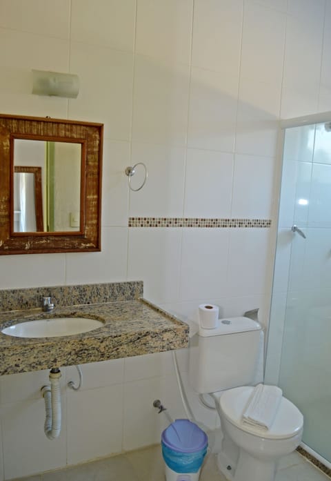 Deluxe Room | Bathroom | Hair dryer, towels, soap, toilet paper