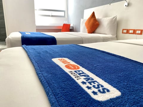 Family Room, 2 Double Beds | In-room safe, desk, laptop workspace, free WiFi