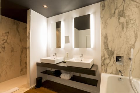 Deep soaking tub, eco-friendly toiletries, hair dryer, towels