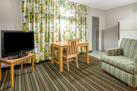 Suite, 2 Double Beds, Non Smoking | Desk, laptop workspace, iron/ironing board, free WiFi