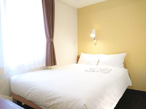 Semi-double Room, Non Smoking | Down comforters, desk, blackout drapes, free WiFi