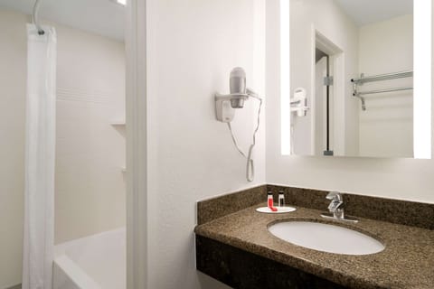 Combined shower/tub, eco-friendly toiletries, hair dryer, towels