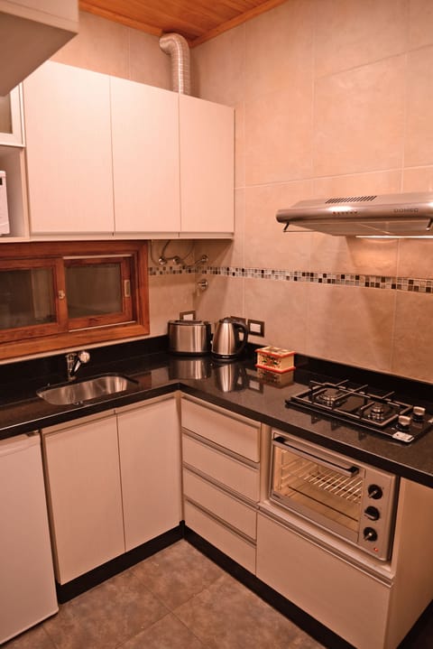 Deluxe Triple Room, 1 Bedroom, Patio, Garden View | Private kitchen | Fridge, microwave, electric kettle, paper towels