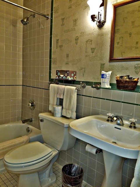 Family Room, Multiple Beds | Bathroom | Combined shower/tub, hair dryer, towels, soap