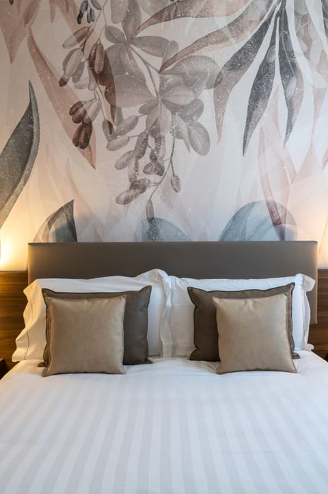 Premium bedding, minibar, in-room safe, desk