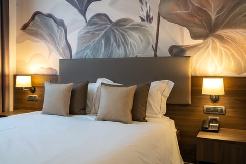 Premium bedding, minibar, in-room safe, desk