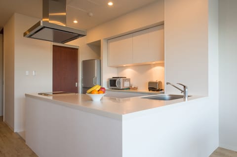 Deluxe Room, 2 Bedrooms | Private kitchen | Full-size fridge, microwave, oven, stovetop