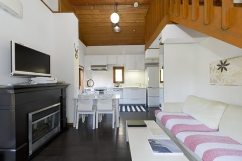 Cottage, 1 Bedroom (+ Loft) | Living area | Flat-screen TV, DVD player