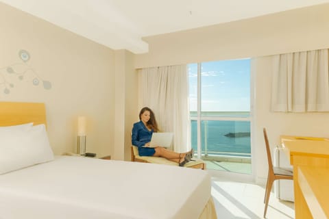 Standard Room, 2 Twin Beds, Balcony, Ocean View | Minibar, in-room safe, desk, blackout drapes