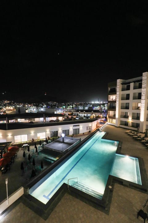 Outdoor pool, pool umbrellas, sun loungers