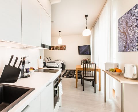 Design Studio Apartment | Private kitchen | Full-size fridge, microwave, oven, stovetop