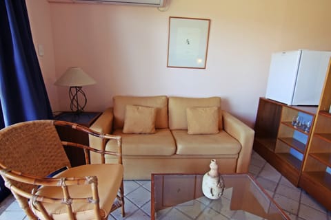 Suite, 1 Queen Bed | Minibar, desk, blackout drapes, iron/ironing board