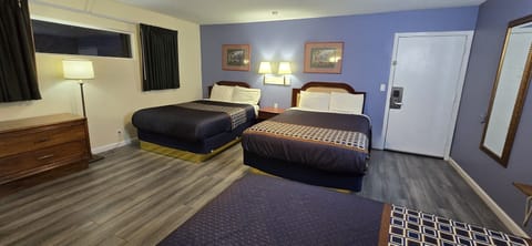 Suite, Multiple Beds, Non Smoking | Down comforters, individually decorated, individually furnished, desk