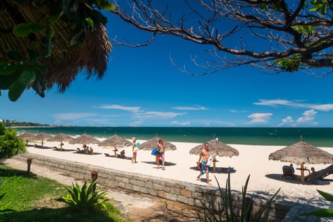 Private beach, white sand, sun loungers, beach umbrellas