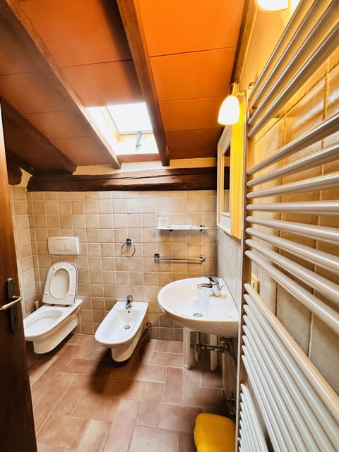 Apartment, 2 Bedrooms | Bathroom | Shower, free toiletries, hair dryer, slippers