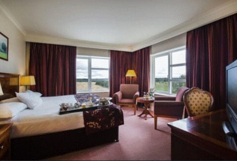 Deluxe Double Room, Multiple Beds, Golf View | In-room safe, desk, iron/ironing board, free WiFi