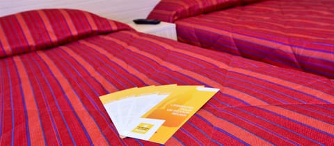 Desk, blackout drapes, free WiFi, bed sheets