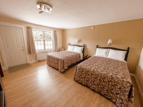 Standard Room - Two Double Beds, Fridge & Microwave                                                  | Individually decorated, blackout drapes, iron/ironing board, free WiFi