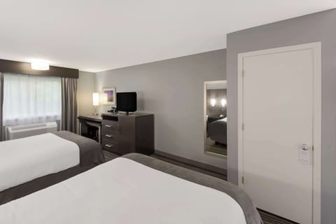 Premium bedding, desk, iron/ironing board, rollaway beds