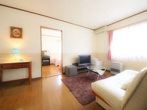 Junior Suite, 2 Bedrooms, Refrigerator, Mountain View | Down comforters, blackout drapes, free WiFi, bed sheets