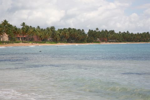 Beach nearby, white sand, sun loungers, beach towels