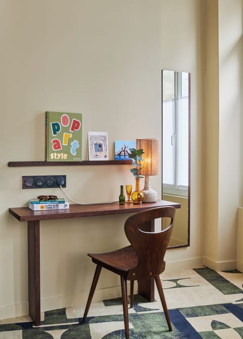 Premium bedding, desk, laptop workspace, blackout drapes